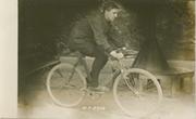 T PECK (BRITISH EMPIRE CHAMPION) CYCLING POSTCARD