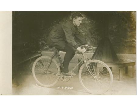T PECK (BRITISH EMPIRE CHAMPION) CYCLING POSTCARD